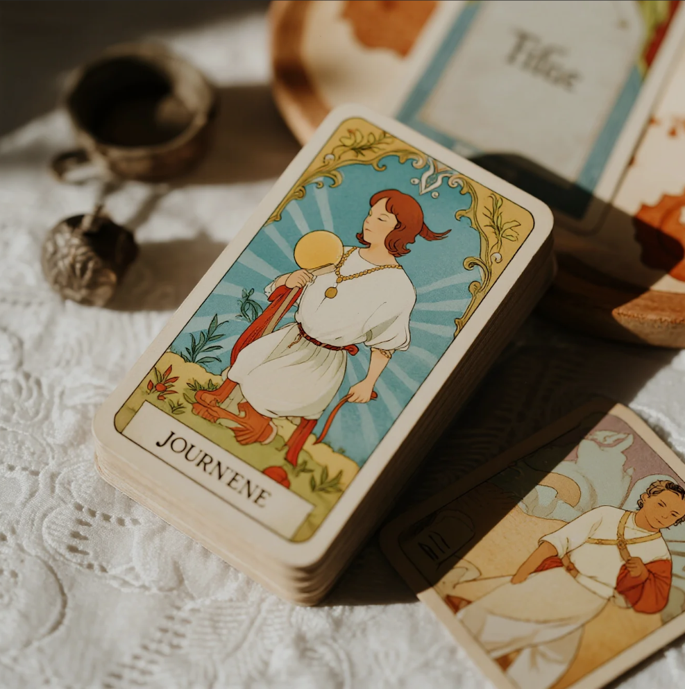 Symbolic cards of Arcane Fortune guiding an individual through life changes